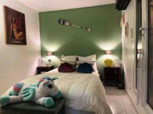 Posteľ alebo postele v izbe v ubytovaní Appartement Vintage 90 m2 DUPLEX classé