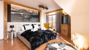 Łóżko lub łóżka w pokoju w obiekcie Aparthotel Delta Top