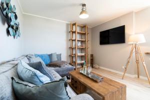 TV a/nebo společenská místnost v ubytování Ferienwohnung Puro