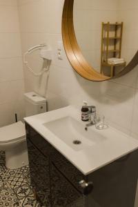 Kúpeľňa v ubytovaní Villa Monica Apartamenty