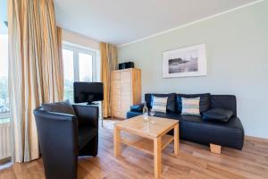 Posezení v ubytování Wohnpark am Mühlenteich - Appartement 27