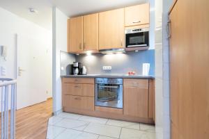 Kuchyň nebo kuchyňský kout v ubytování Wohnpark am Mühlenteich - Appartement 27