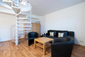 Posezení v ubytování Wohnpark am Mühlenteich - Appartement 27