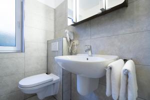 Koupelna v ubytování Wohnpark am Mühlenteich - Appartement 27