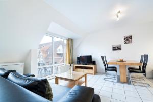 Posezení v ubytování Wohnpark am Mühlenteich - Appartement 24