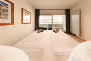 Posteľ alebo postele v izbe v ubytovaní Apartment Alpenblick