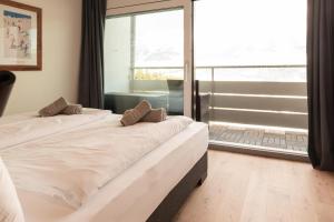 Posteľ alebo postele v izbe v ubytovaní Apartment Alpenblick