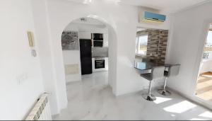 Kuchnia lub aneks kuchenny w obiekcie Luxury 2 bed Penthouse on Golf Course Murcia