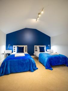 En eller flere senge i et værelse på Huge 2 Bedroom 2 Bathroom Apartment - Northgate House