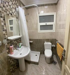 Koupelna v ubytování Your Comfortable Home
