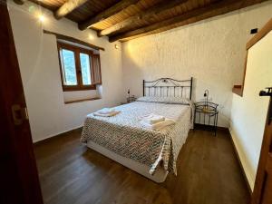 Łóżko lub łóżka w pokoju w obiekcie Casa Barranco