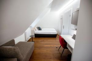Postel nebo postele na pokoji v ubytování Reos Hotel Wangen