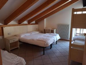 Postel nebo postele na pokoji v ubytování Villa San Carlo