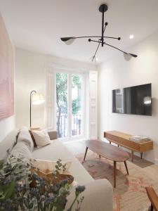Телевизор и/или развлекательный центр в Luxury Flat next to Gran Via Madrid