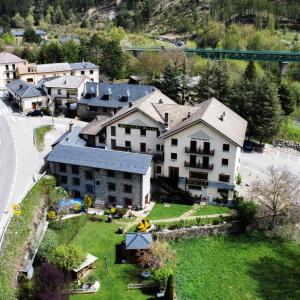 an aerial view of a building in a village at Meson de Castiello in Castiello de Jaca