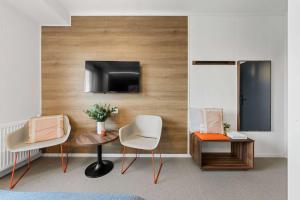 TV a/nebo společenská místnost v ubytování Aiden by Best Western Herning