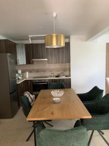 Kuchyňa alebo kuchynka v ubytovaní Sinus Prémium Aparthotel Siófok