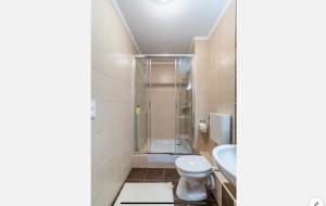 Kúpeľňa v ubytovaní Sinus Prémium Aparthotel Siófok