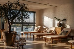 Uma área de estar em Van der Valk Hotel Gent