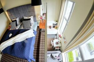Posteľ alebo postele v izbe v ubytovaní 408 w ROYAL TULIP SAND 200 m plaża prywatny DOBRUK APARTAMENTY