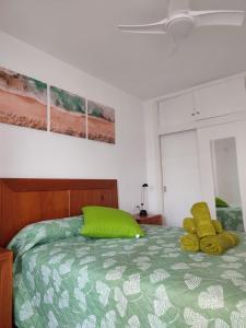 A bed or beds in a room at Precioso alojamiento junto al Mediterráneo