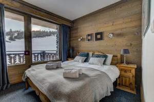 Zdjęcie z galerii obiektu Luxurious Ski-in Ski-out Duplex on Ski Slope w Courchevel