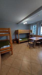 Posteľ alebo postele v izbe v ubytovaní Apartamenty Suzyw Pilsko
