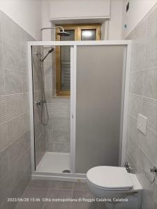 a bathroom with a shower and a toilet at nonna rosa in Reggio di Calabria