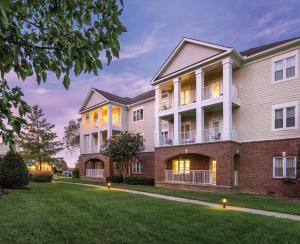 a large house with a lawn in front of it at Club Wyndham Nashville in Nashville