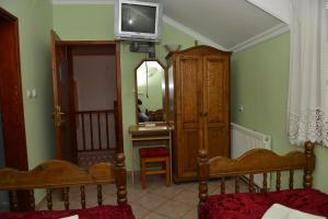 Llit o llits en una habitació de Sneža