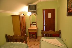Llit o llits en una habitació de Sneža