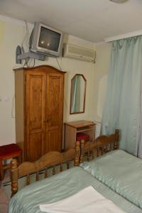 Llit o llits en una habitació de Sneža