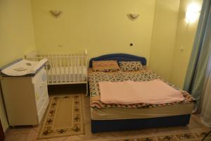 Llit o llits en una habitació de Sneža