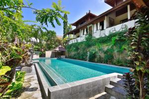 Бассейн в Bali Spirit Hotel and Spa, Ubud или поблизости