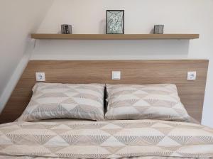 A bed or beds in a room at Modessa