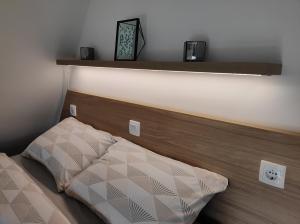 A bed or beds in a room at Modessa