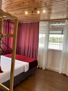 a bedroom with a bunk bed and a window at PANORAMA CITY SUITE in Istanbul