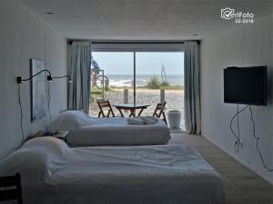 Ένα ή περισσότερα κρεβάτια σε δωμάτιο στο Hotel Aquarella +74 φωτογραφίες