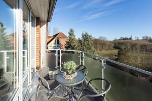 Balkón nebo terasa v ubytování Wohnpark am Mühlenteich - Appartement 27