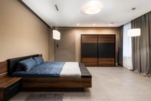 Posteľ alebo postele v izbe v ubytovaní Apartament PLATYNOWY - Centrum Gliwic z parkingiem