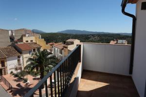 a balcony with a view of a city at Ca ma mare in Useras