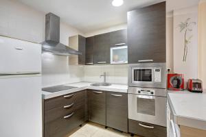 Kuchyň nebo kuchyňský kout v ubytování Apartamento El Mocan - Palm Mar