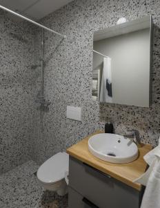 Koupelna v ubytování Center apartments - Hekla