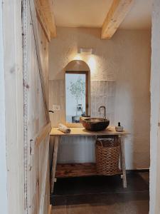 a bathroom with a sink and a mirror at BarnHaus in Jibert +56 photos