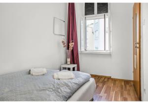 Welcoming 2BR Apt. Near Danube & Millenium Tower客房内的一张或多张床位