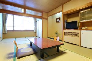 ครัวหรือมุมครัวของ Awara Onsen hot spring Koubou Gurabaatei +27 ภาพ