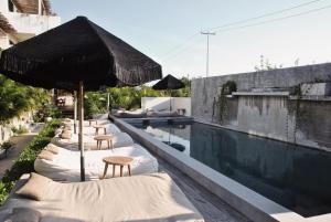 Bazén v ubytování Boutique Hotel EL NIDO Holbox nebo v jeho okolí