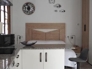 TV a/nebo společenská místnost v ubytování El APARTAMENTUCO