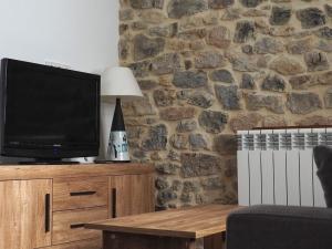 TV a/nebo společenská místnost v ubytování El APARTAMENTUCO