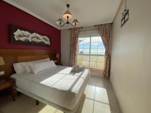 Postel nebo postele na pokoji v ubytování Panoramic Penthouse + 15 fotografií